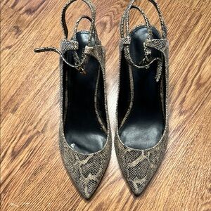 Express Black and Tan Heels with Ankle Ties
Gently worn with small imperfections